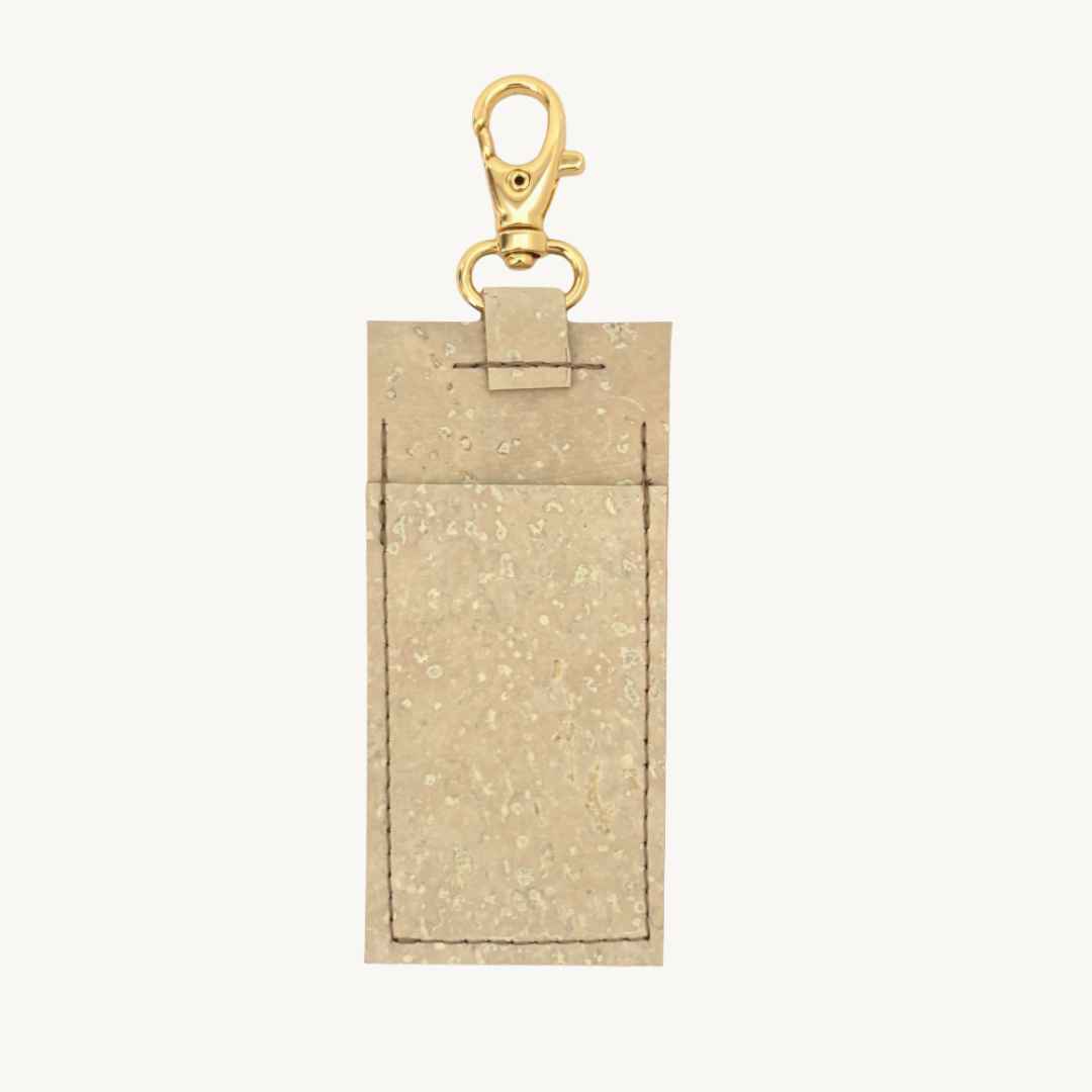 handmade cork leather lip balm holder in ivory with vegan cork keychain and eco-friendly design