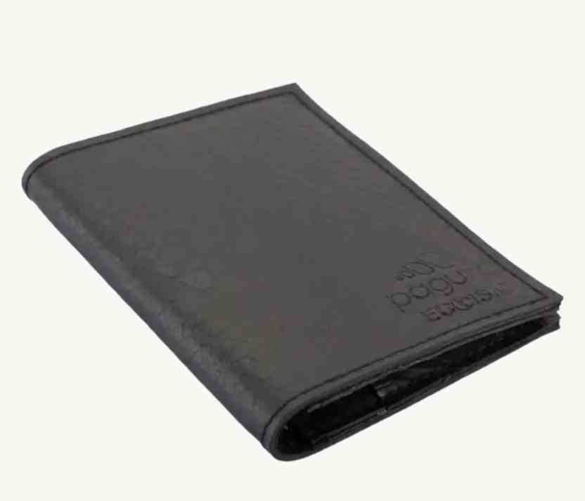 Close-up of vegan leather embossing on the wallet’s front, showcasing subtle textured pattern and precise stitching details