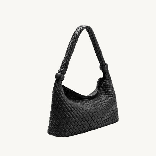woven vegan leather purse in black side view