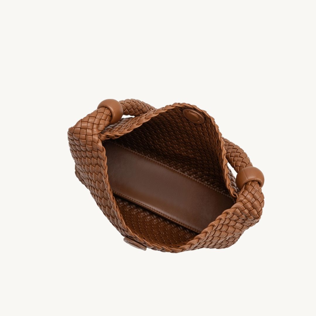 woven vegan leather purse in saddle interior view