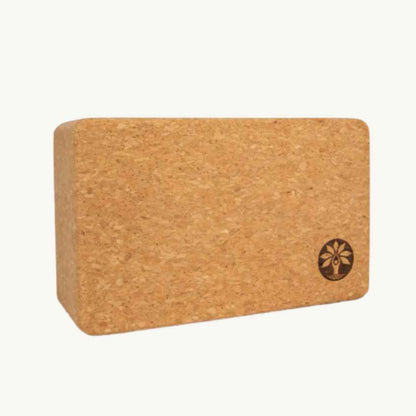 Close-up of the cork yoga mat’s textured surface and embedded anti-slip grip patterns at a slight angle showcasing