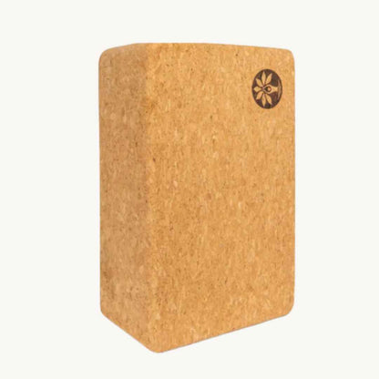 Close-up of the cork yoga mat’s textured surface with hand grip markings and subtle wood grain pattern, showcasing