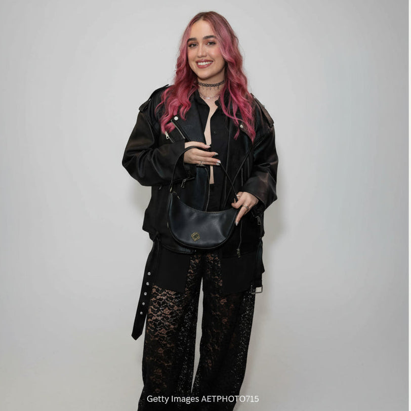 Latin Grammy Winner Ela Taubert with a vegan moon bag