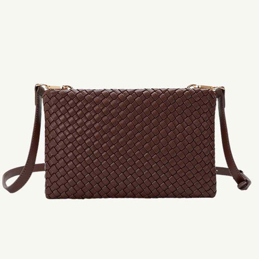 Close-up of woven recycled PU leather texture on the Daisy vegan crossbody bag’s front flap, highlighting intricate weaving