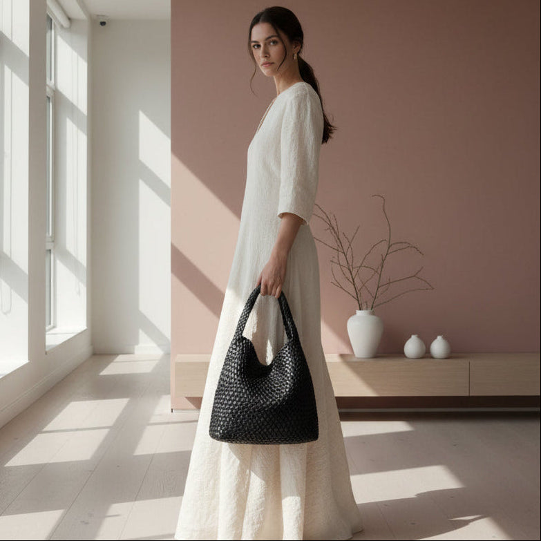 vegan leather woven handbag in black