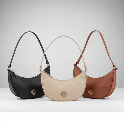 Close-up of the Moon Bag's textured Corn Leather surface with visible grain and subtle stitching details, highlighting