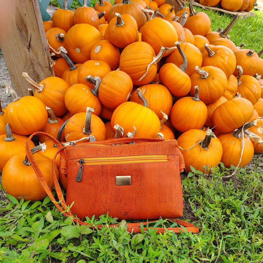 Close-up of the Iris Cork Leather Crossbody Bag’s adjustable strap buckle and textured vegan leather surface detail