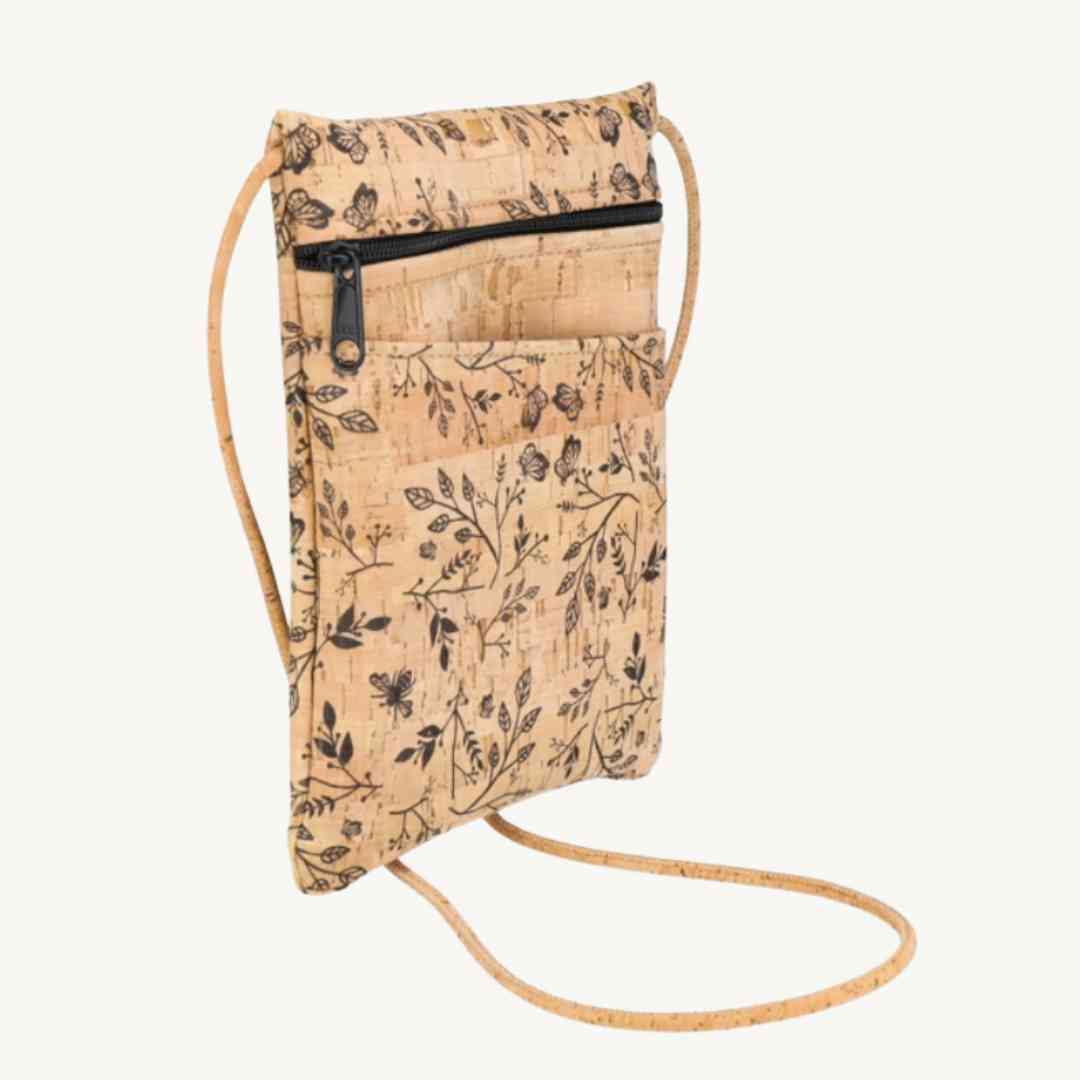 Close-up of the Be Lively Print Crossbody strap featuring vibrant floral pattern and textured woven fabric detail from a