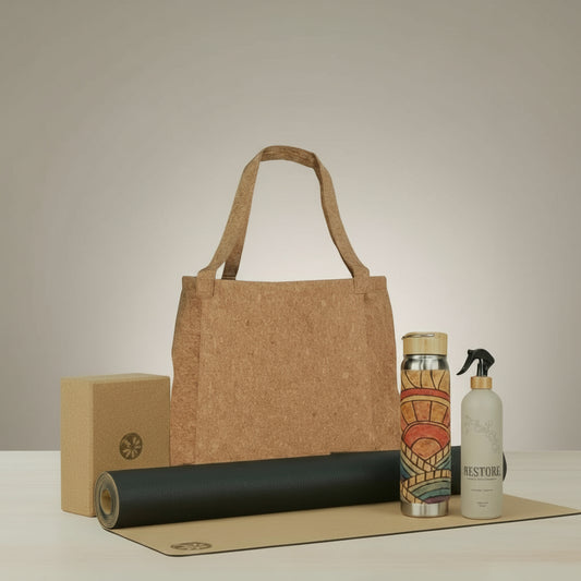 Cork tote bag with yoga mat, water bottle, and spray bottle on a beige background