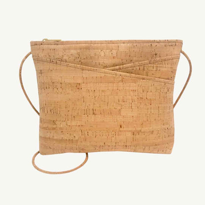 Close-up of the cork vegan crossbody clasp with silver-toned metal hardware and subtle embossed logo detail