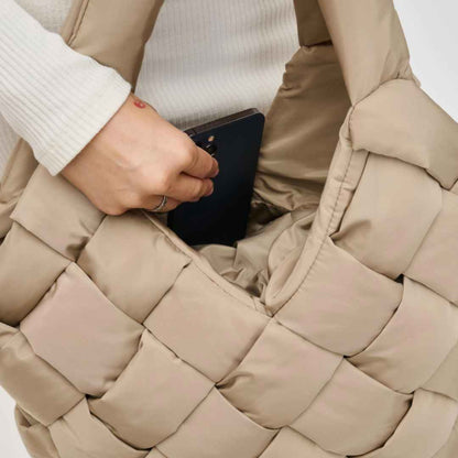 close up of vegan handbag woven from recycled nylon