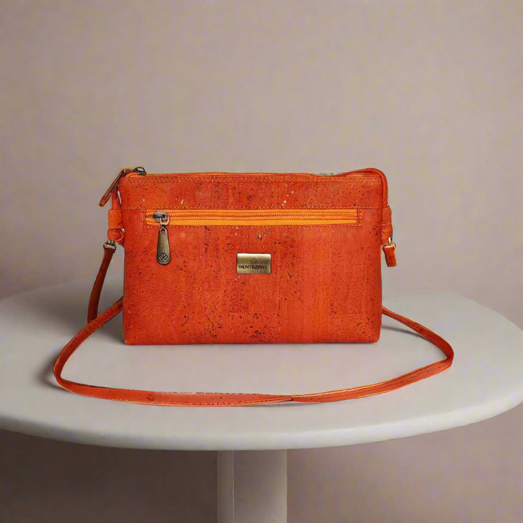 Close-up of the Iris Cork Leather Crossbody Bag’s textured vegan leather strap detail from a front-angle view