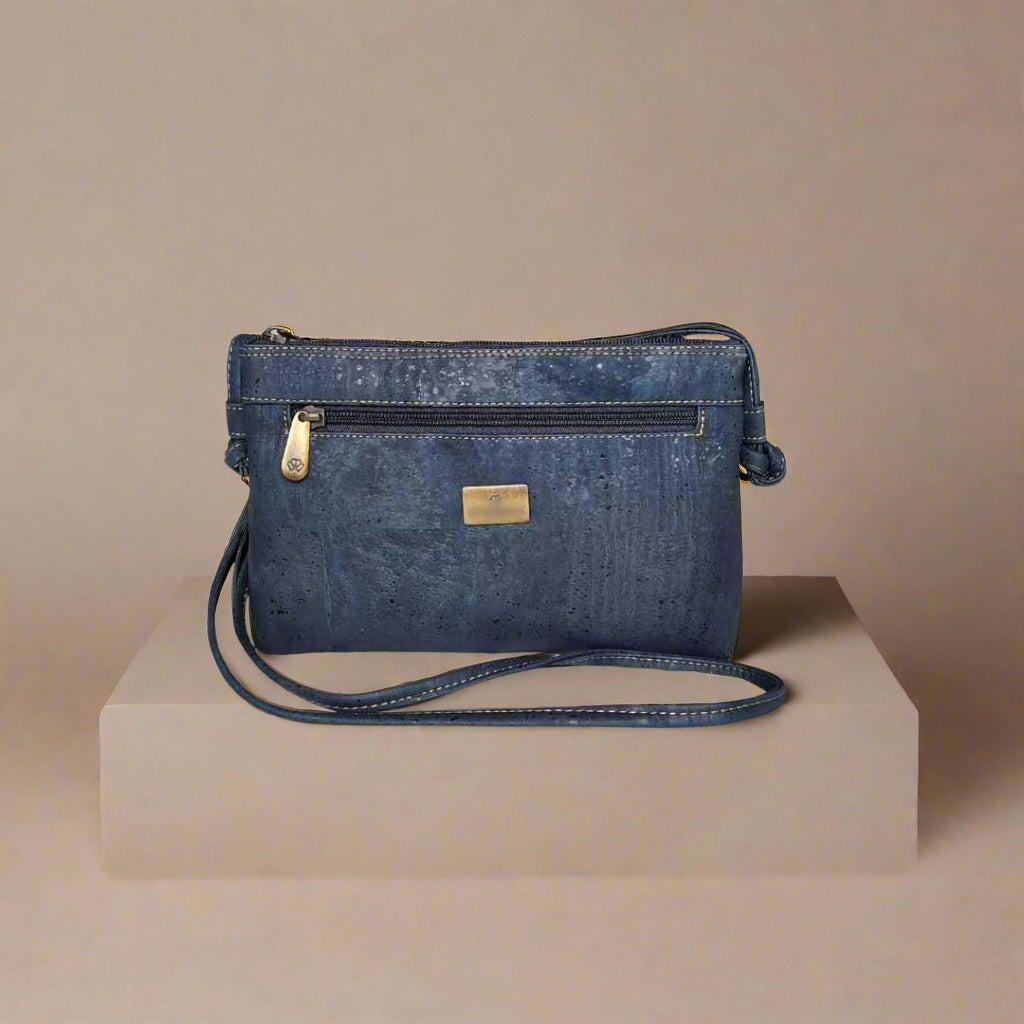 Close-up of the Iris Cork Leather Crossbody Bag’s textured vegan cork material highlighting fine grain details from a