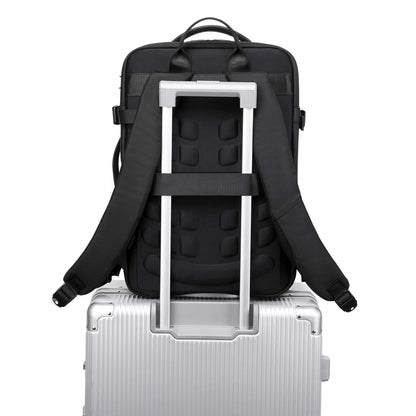 expandable vegan laptop bag and briefcase on a suitcase