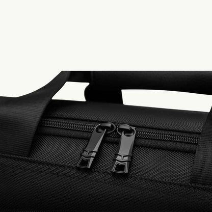 large black vegan duffle bag for work and travel up close zippers