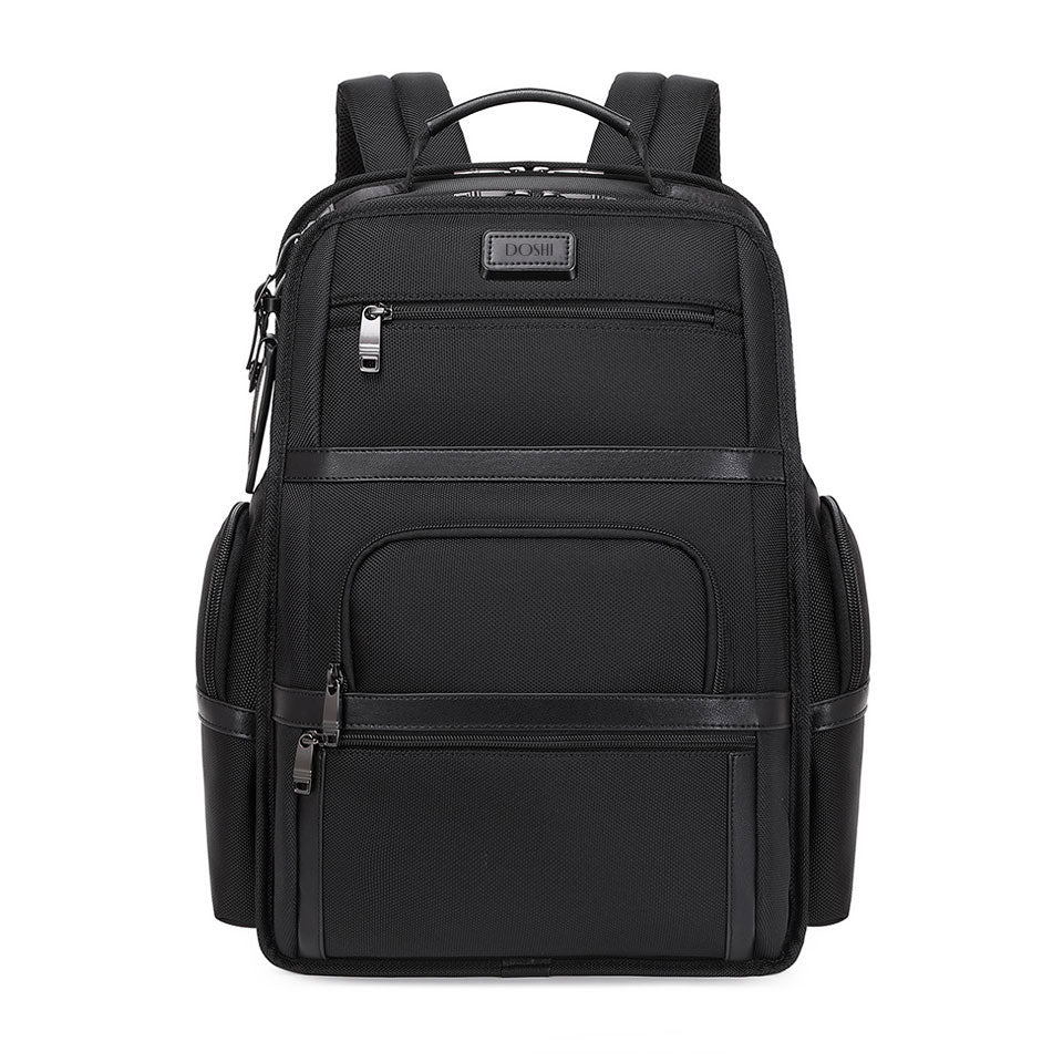 Black backpack with multiple pockets and zippers on a white background