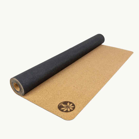 Yoloha Yoga Nomad Air cork travel yoga mat in natural light tan with textured grain, lightweight design and 72-inch length