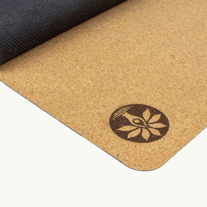 Close-up of the Nomad Air Cork Yoga Mat’s textured surface showing natural cork grain and subtle grip patterns from an