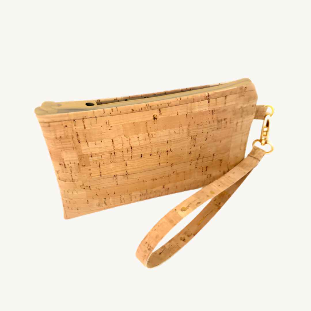 Close-up of the vegan cork leather wristlet’s textured surface and contrast stitching along the top edge