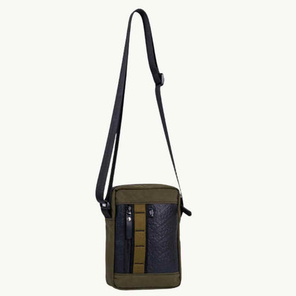 Close-up of adjustable strap buckle with visible stitching and upcycled rubber texture detail on Major Vegan Crossbody