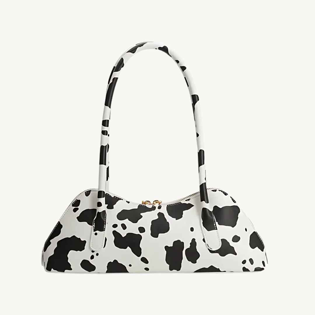 vegan leather purse with cow print