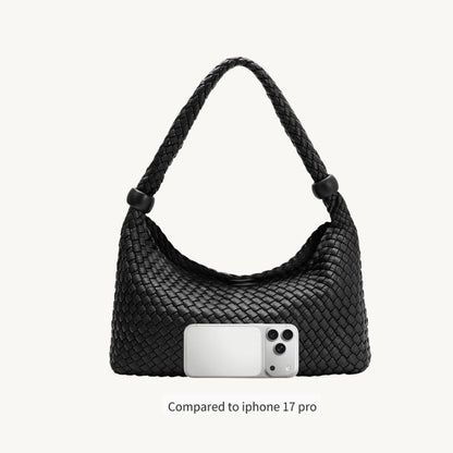 woven vegan leather handbag in black compared to iphone 17