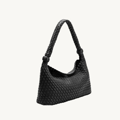 woven vegan leather purse in black side view